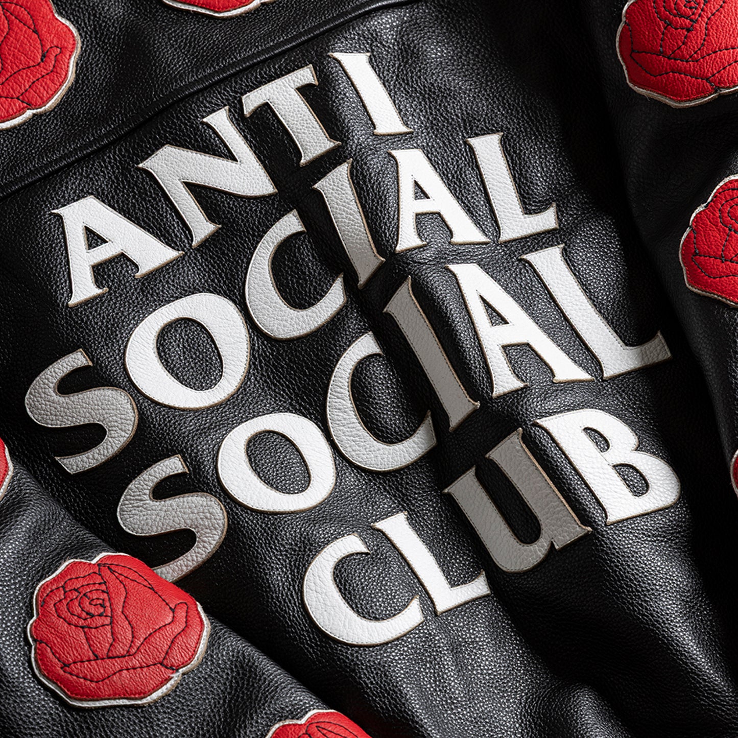 PETAL TO THE METAL LEATHER VARSITY JACKET - BLACK